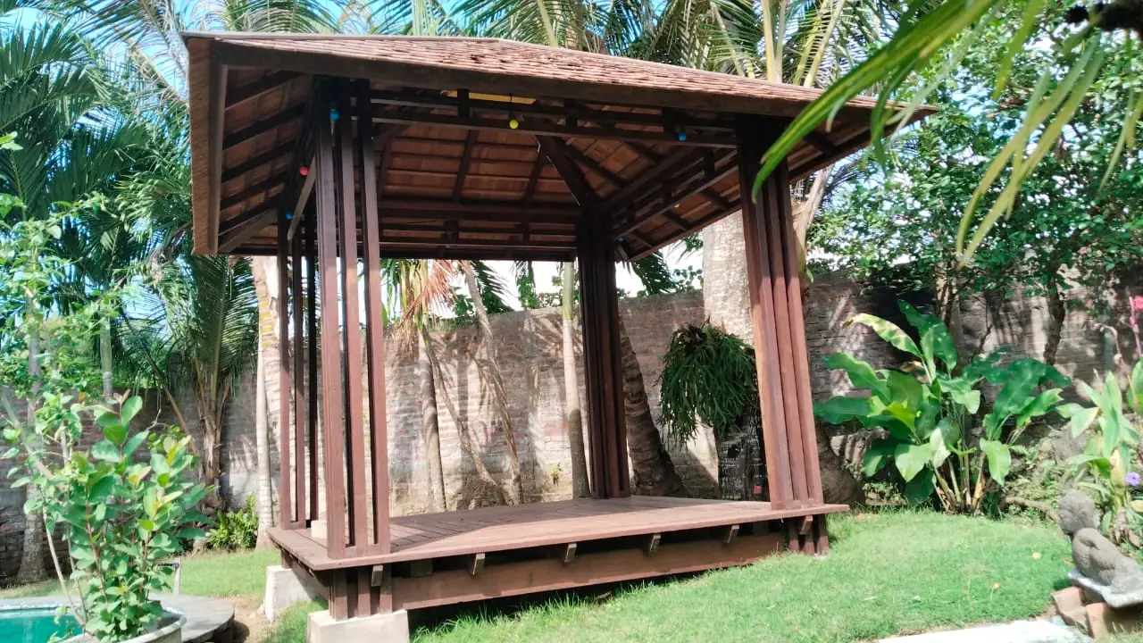 Gazebo with a roof covered in ulin shingles